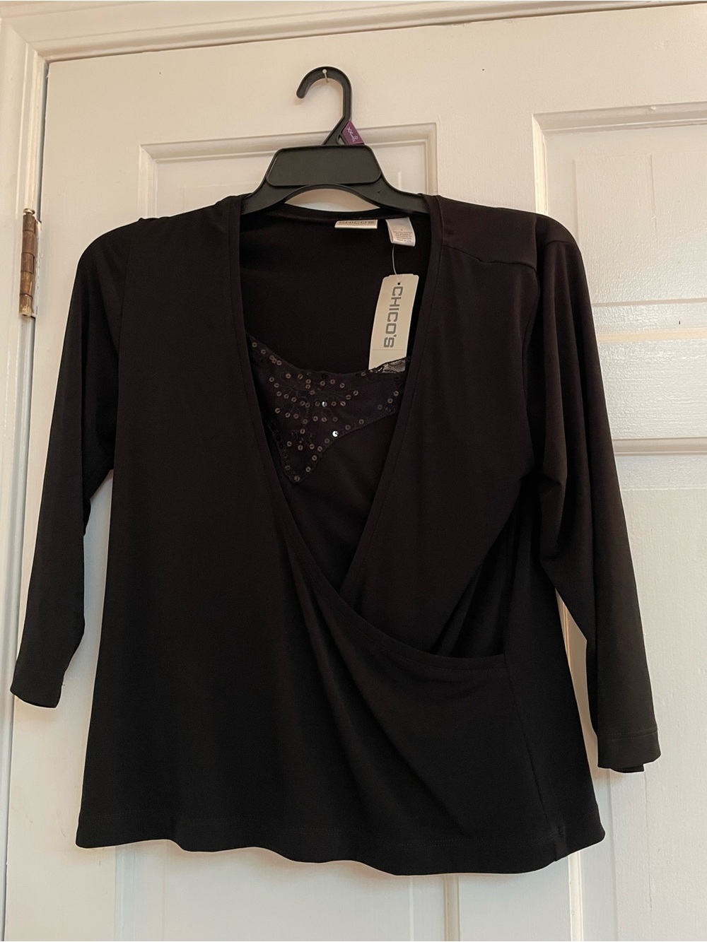 Brand new Chico's Black Knit V-Neck Top with Sequin Mesh Inset